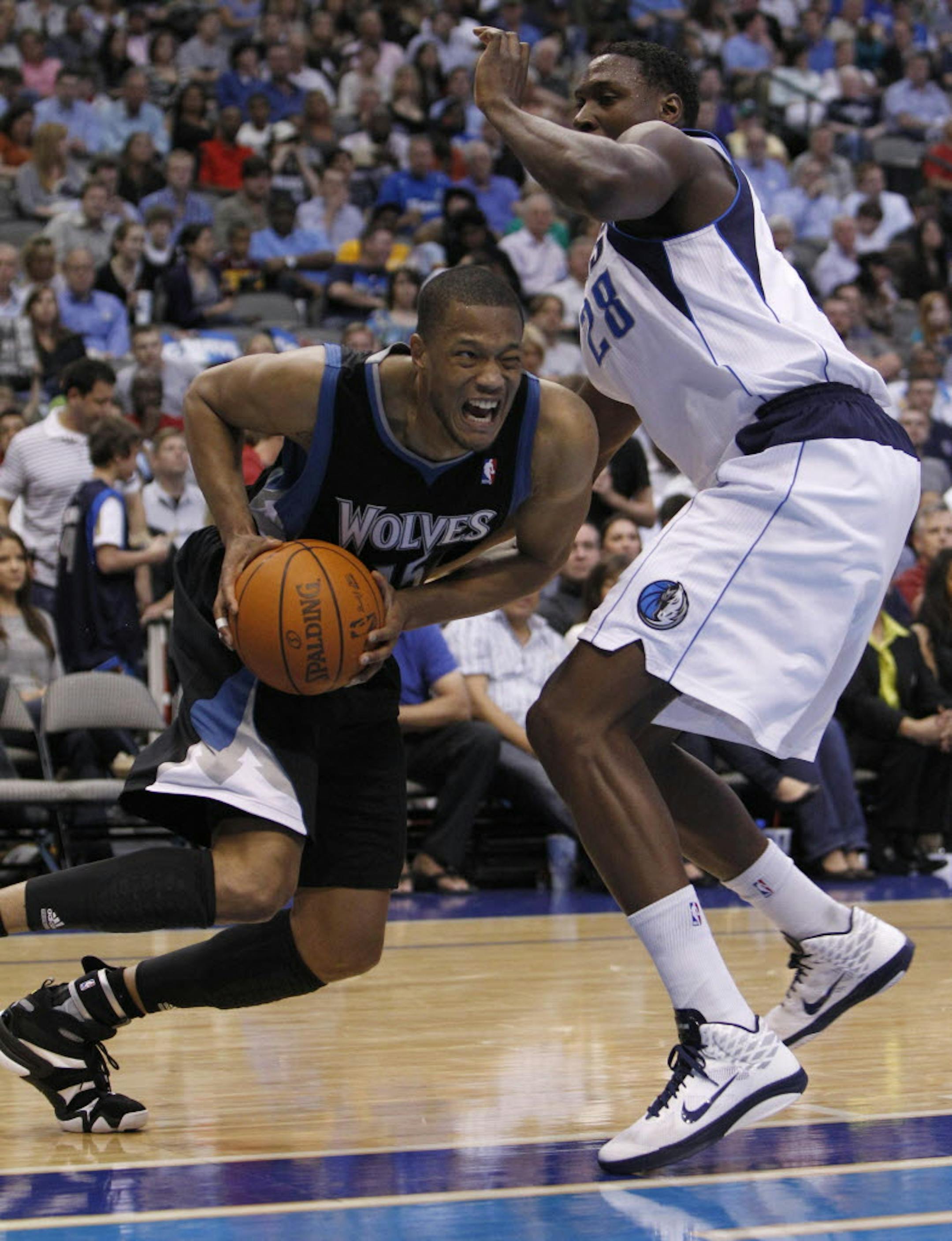 Minnesota's Anthony Randolph drives against Dallas' Ian Mahinmi.