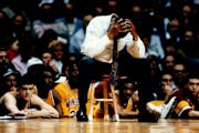 March 7, 1992 Minn Vs Purdue at Williams Arena... XClem Haskins hangs his head in frustration during final minutes of 2nd half .... March 8, 1992 Rich