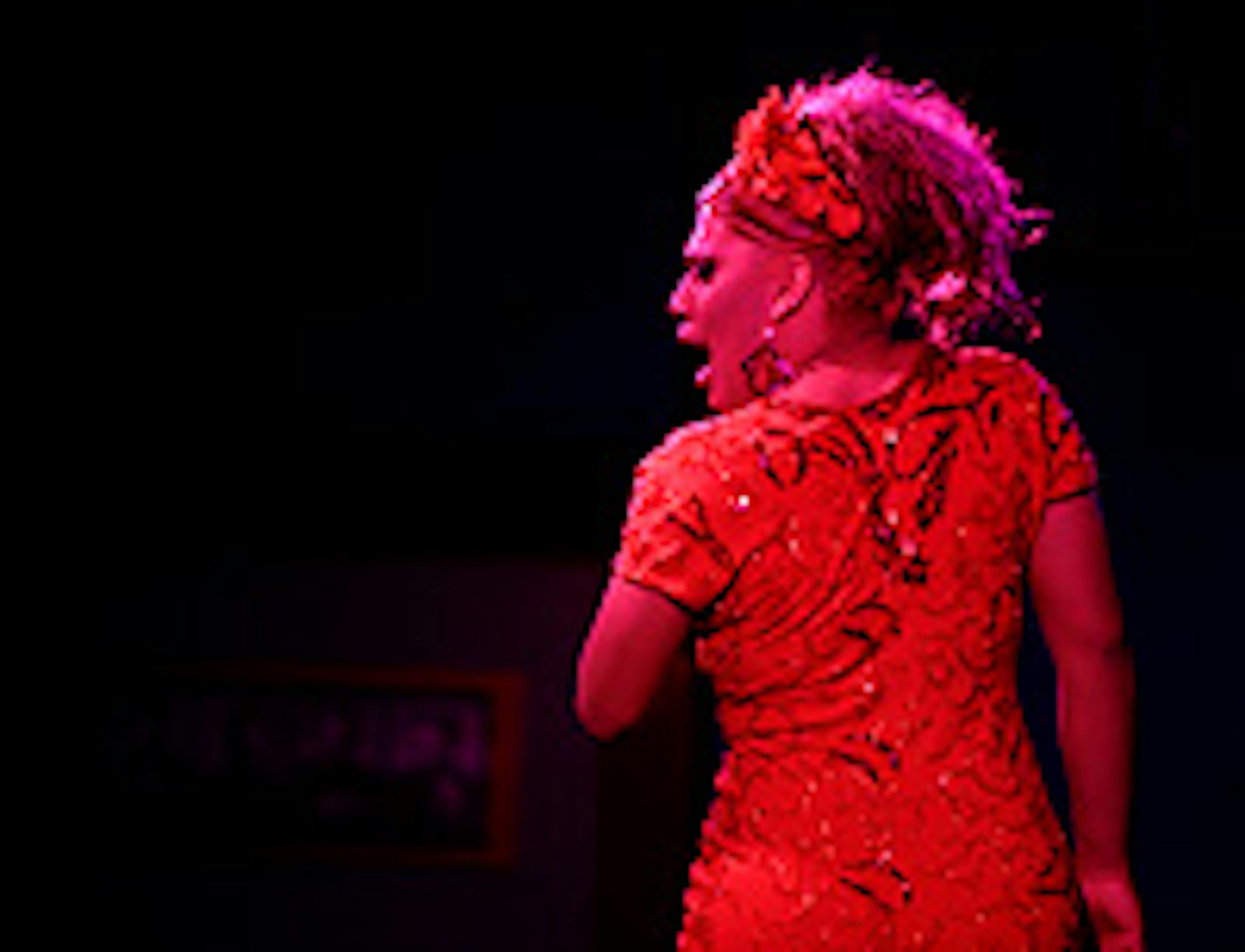 "Salma," performs a song by lip-syncing an Amanda Miguel hit at The Saloon during "Fiesta Latino."