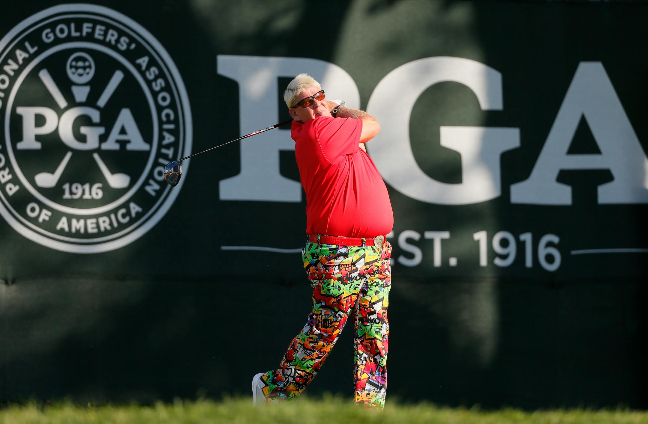 John Daly watches his tee shot on the first hole during the first round of the PGA Championship golf tournament at Baltusrol Golf Club in Springfield, N.J., Thursday, July 28, 2016. (AP Photo/Tony Gutierrez)