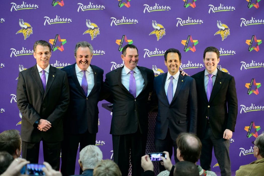 The Vikings introduced Mike Zimmer as their new head coach in 2014. On stage are general manager Rick Spielman. chairman Zygi Wilf, Zimmer, team president Mark Wilf and vice president Jonathan Wilf. Of the nine top Vikings executives, all are white.