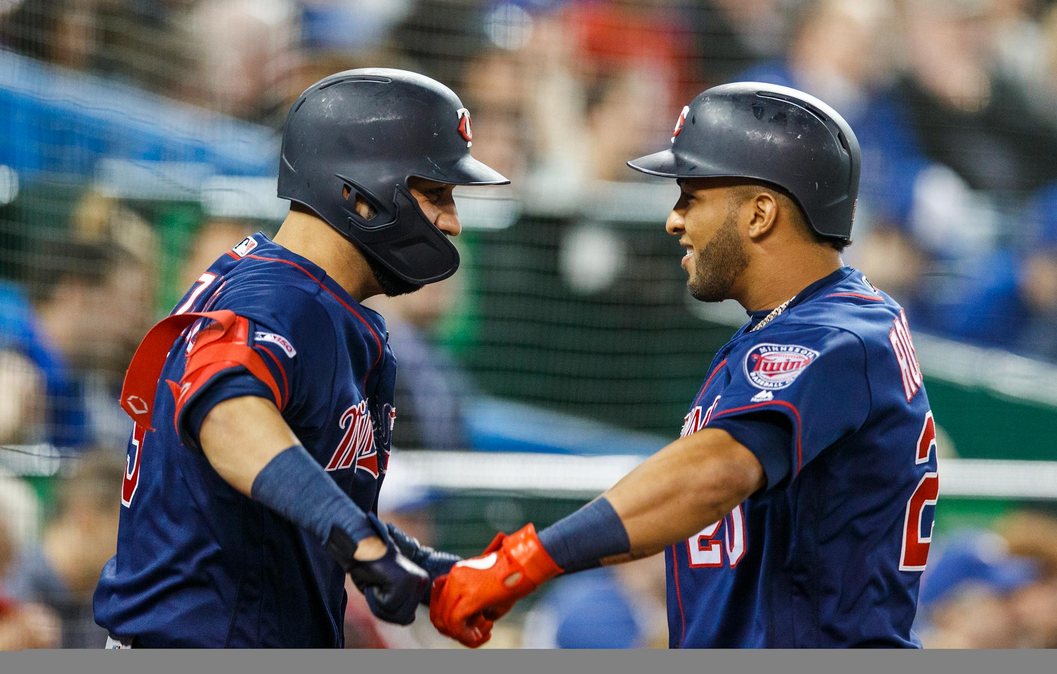 The Twins' Eddie Rosario, right, celebrated his fifth-inning home run against Toronto with teammate Marwin Gonzalez on Monday.