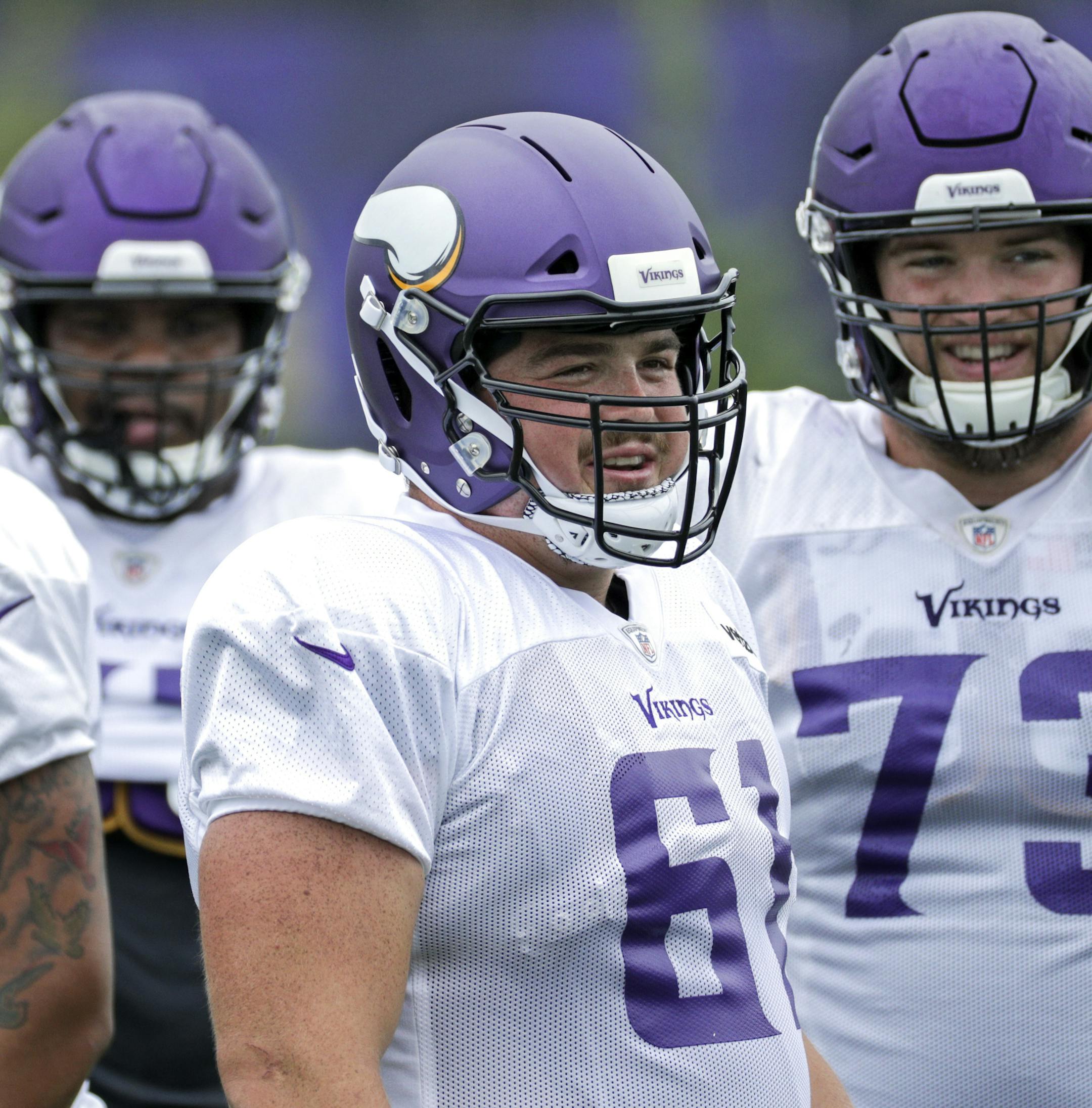 Minnesota Vikings' Brett Jones (61) practices at the NFL football teams practice facility in Eagen, Minn., Monday, Aug. 27, 2018. Vikings center Pat Elflein was held out of the entire preseason while rehabbing from ankle and shoulder surgeries, putting his availability for the opener in doubt. If he's not cleared to play, either Brett Jones or Danny Isidora would snap the ball to Kirk Cousins. (Brian Peterson/Star Tribune via AP)