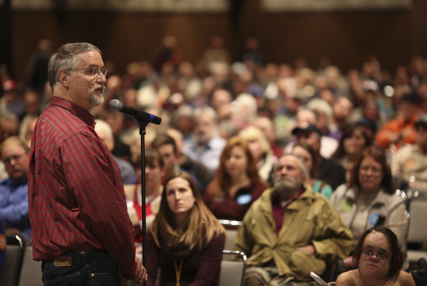 About 1500 people jammed a meeting room at the Duluth Entertainment and Convention Center Thursday night, January 16, 2013 for the first public hearing about a controversial open pit mine near Babbitt that has been proposed by PolyMet Mining Corp. of Canada. Don Arnosti, the policy director of Audubon Minnesota spoke against the proposal.