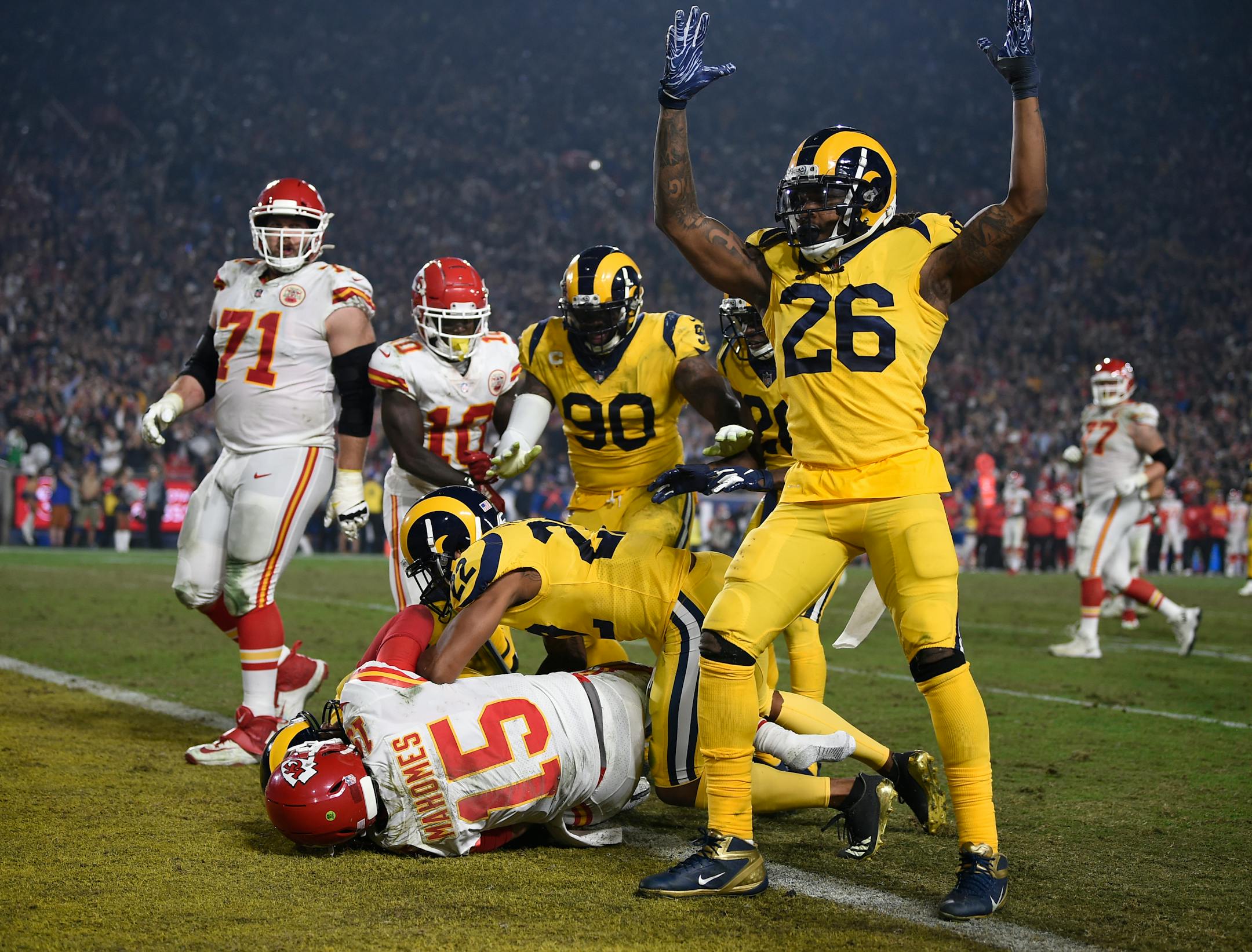 Rams linebacker Mark Barron signaled a touchdown after Chiefs quarterback Patrick Mahomes (15) could not tackle Rams linebacker Samson Ebukam before he reached the end zone on an second-half interception return. The Rams rallied to beat the Chiefs 54-51 in the third-highest-scoring game in NFL history.