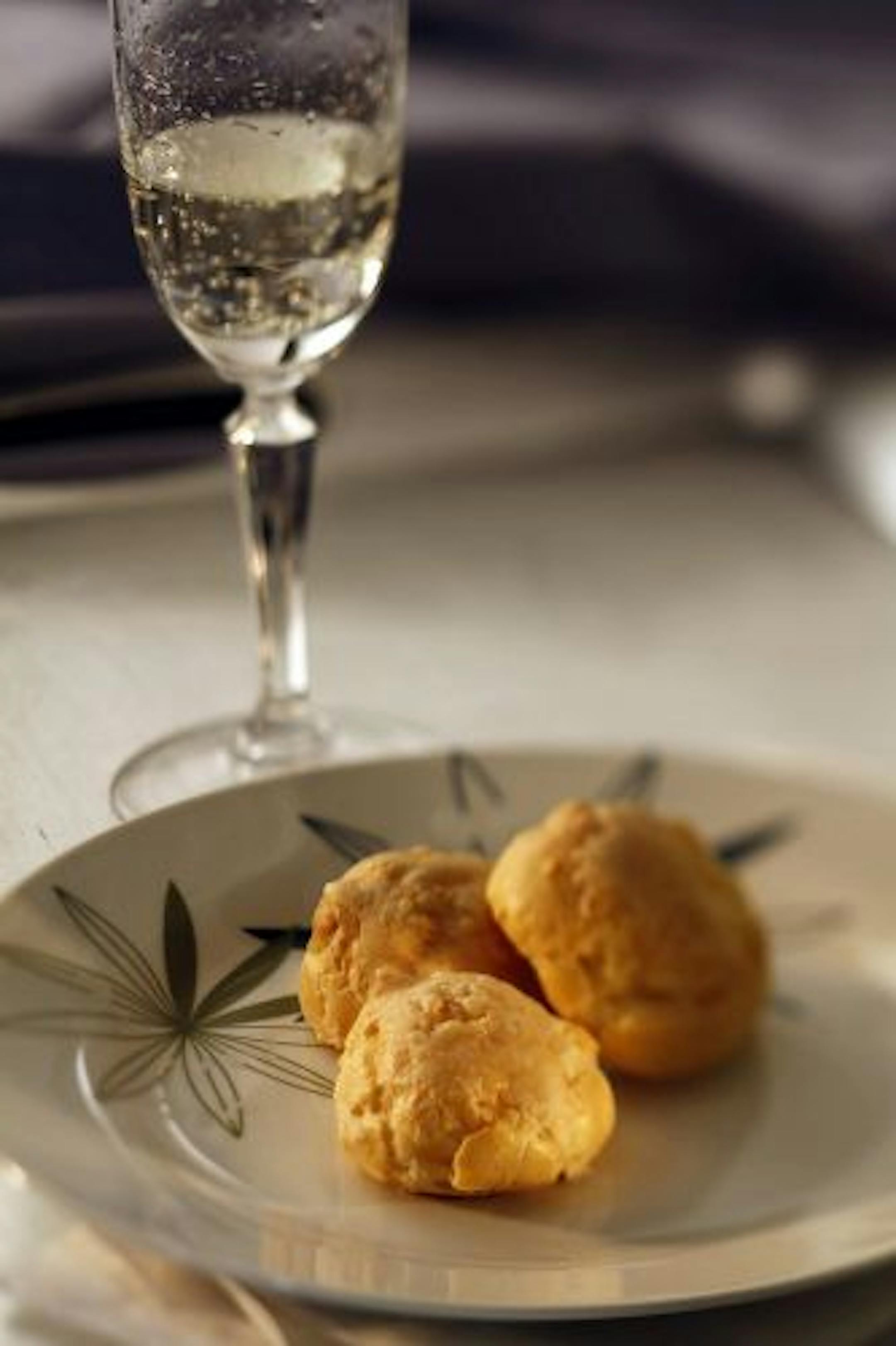 Gougères pair well with a crisp rosé Champagne.