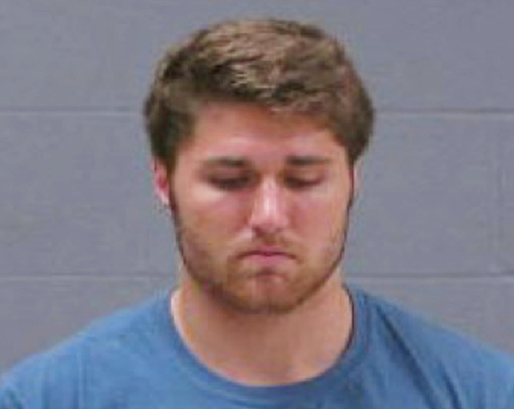 In this May 11, 2014 booking photo provided by Blue Earth County Jail, Philip Nelson, 20, is seen. The former Minnesota Gophers quarterback was arrested in Mankato, Minn., early Sunday, May 11, 2014, on suspicion of third-degree assault. Former Minnesota State, Mankato, linebacker Isaac Dallas Kolstad was in critical condition Monday after an alleged assault involving Nelson. (AP Photo/Blue Earth County Jail) ORG XMIT: CER101