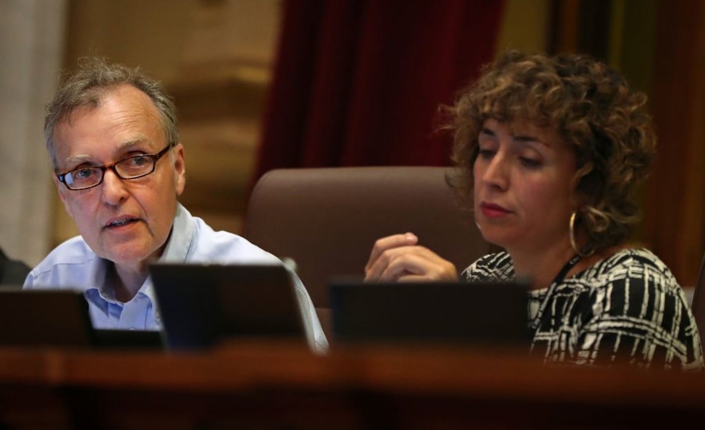 Council Member Cam Gordon discussed his amendment proposal as Council Member Alondra Cano listened.