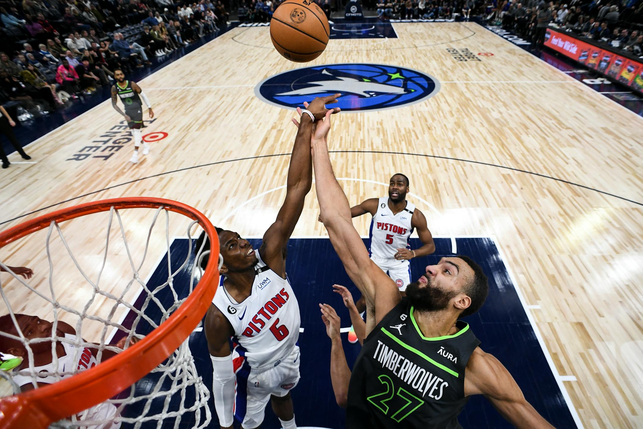 Detroit Pistons guard Hamidou Diallo (6) knocks away the ball from an offensive rebound attempt by Minnesota Timberwolves center Rudy Gobert (27) during the second half.