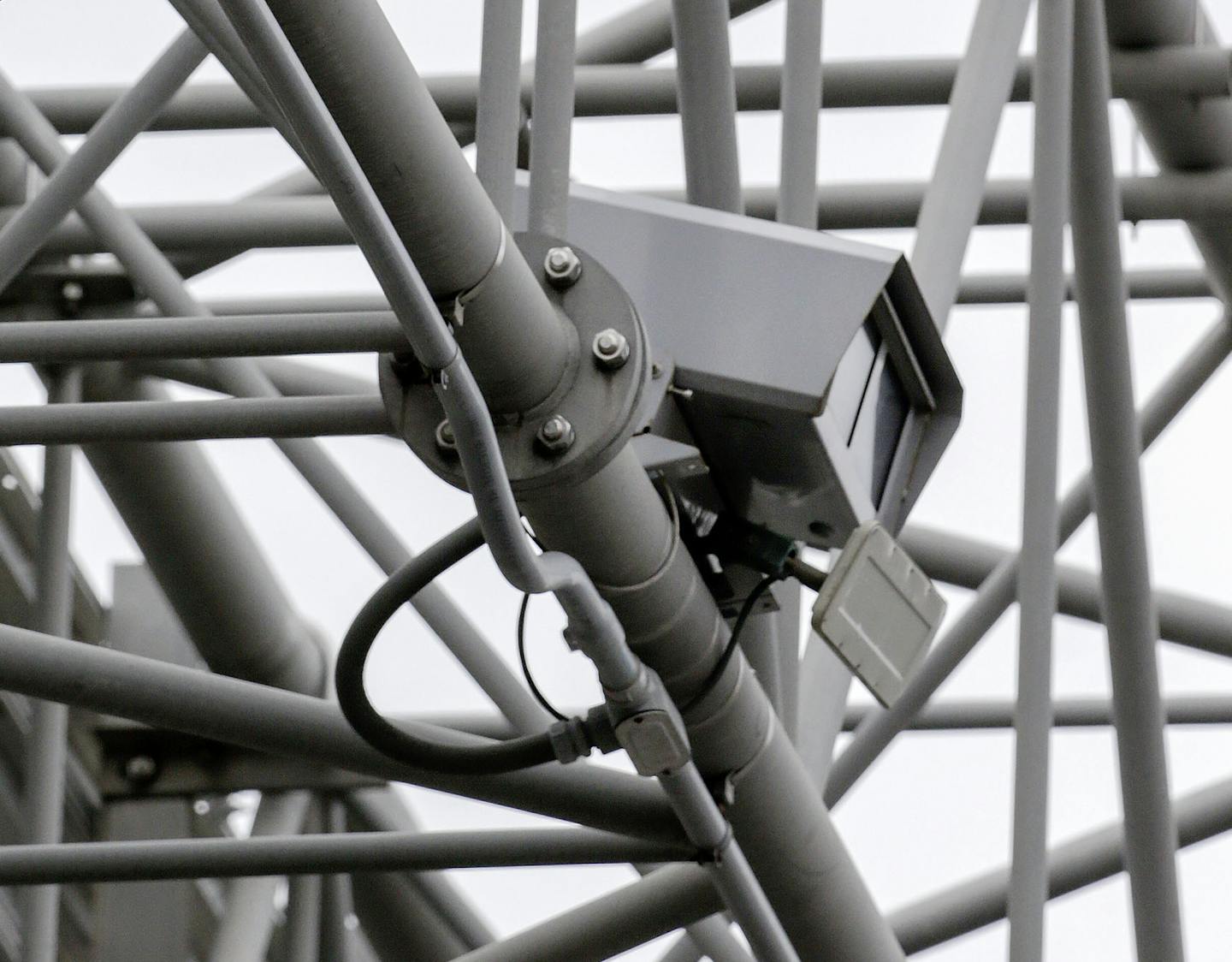 Speed enforcement cameras are seen installed on overhead sign support over northbound Interstate 380 near J Avenue NE in northeast Cedar Rapids, Iowa, on Wednesday, March 18, 2015. The Iowa Department of Transportation ordered the city to cease operation of the cameras and and ones located in the southbound lanes at First Avenue W as motorists have already made their way through the S-curve through downtown Cedar Rapids. (Jim Slosiarek/The Gazette)