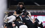 East Ridge dog piles after winning the Class 4A state championships.