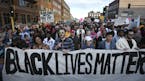 Protesters walked along Washington Avenue during a Black Lives Matter rally on April 29 in Minneapolis.