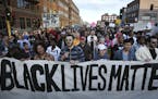 Protesters walked along Washington Avenue during a Black Lives Matter rally on April 29 in Minneapolis.