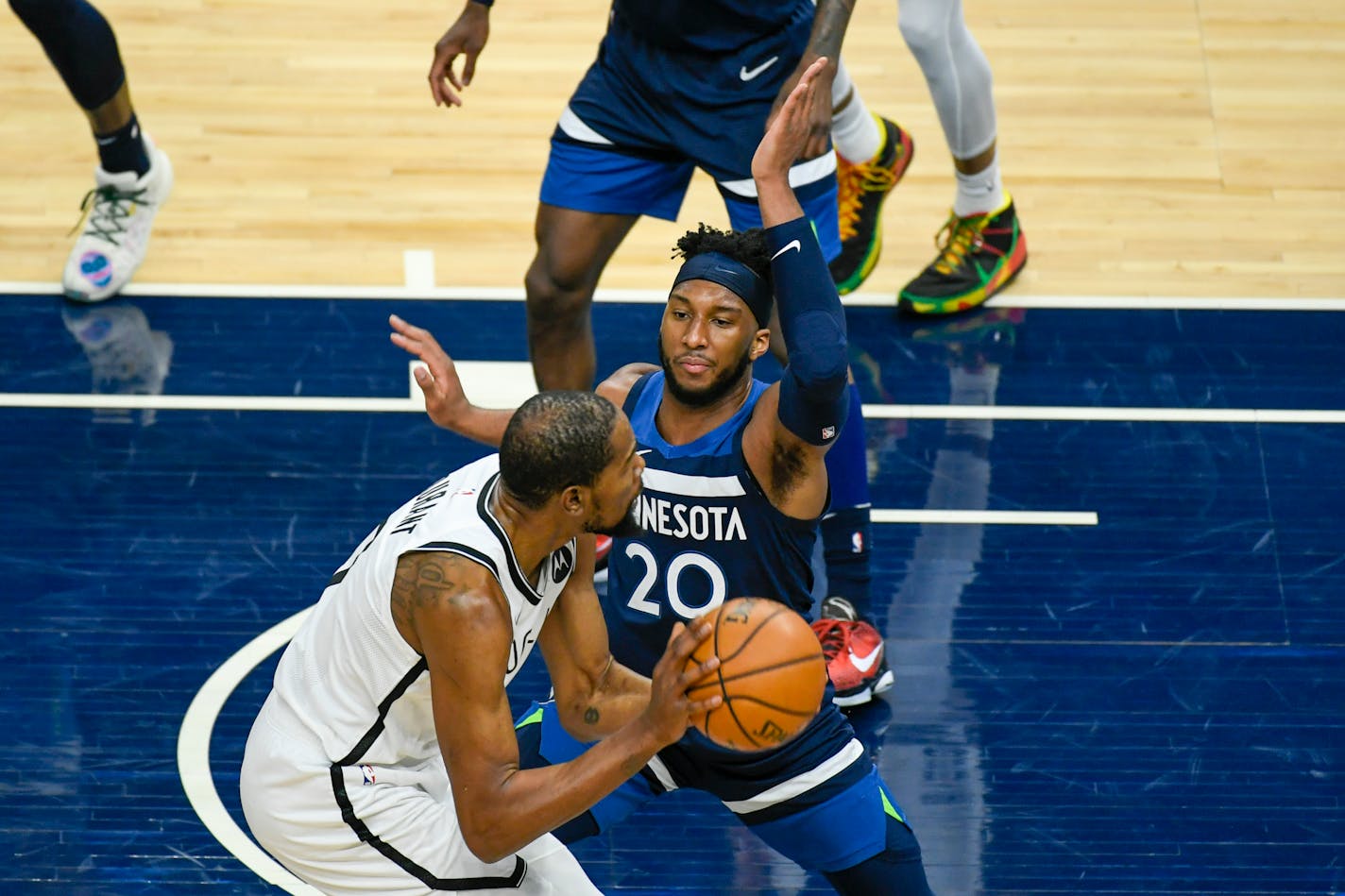 Timberwolves forward Josh Okogie defends against Brooklyn forward Kevin Durant&nbsp;during the second half on April 13.