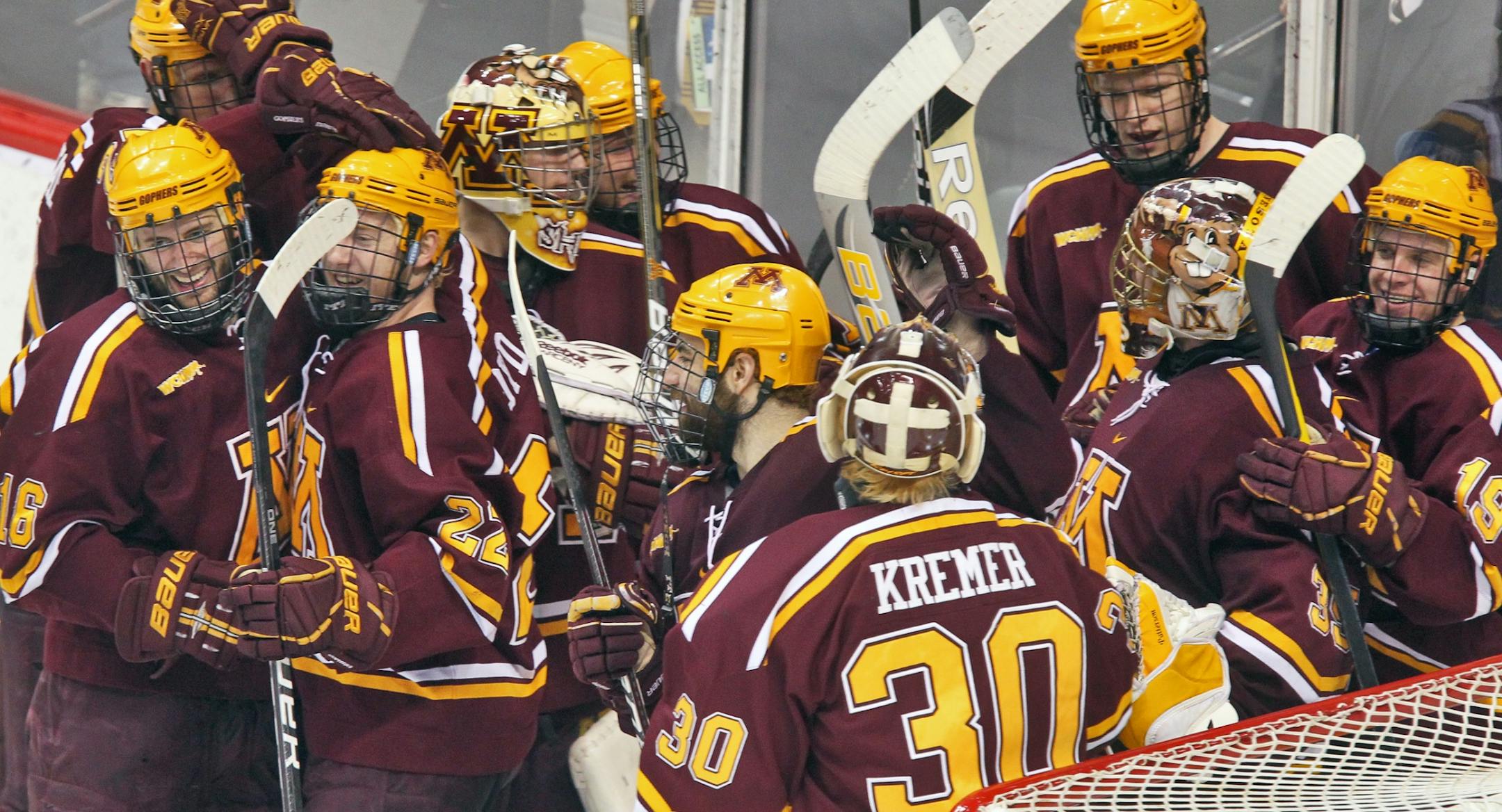 The Gophers celebrate their NCAA West Region championship at Xcel Energy Center.