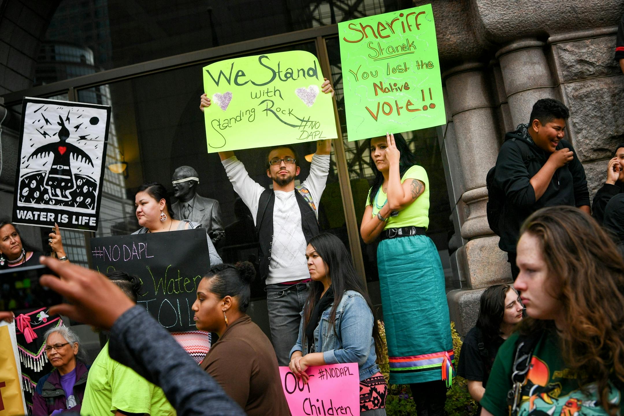 Protesters outside Minneapolis City Hall were angered that Hennepin County Sheriff deputies were participating in Standing Rock where Native People are fighting the pipeline.