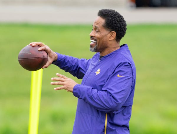 Minnesota Vikings wide receivers coach Keenan McCardell chats with other coaches during Vikings Mini Camp Tuesday, June 7, 2022 at TCO Performance Cen