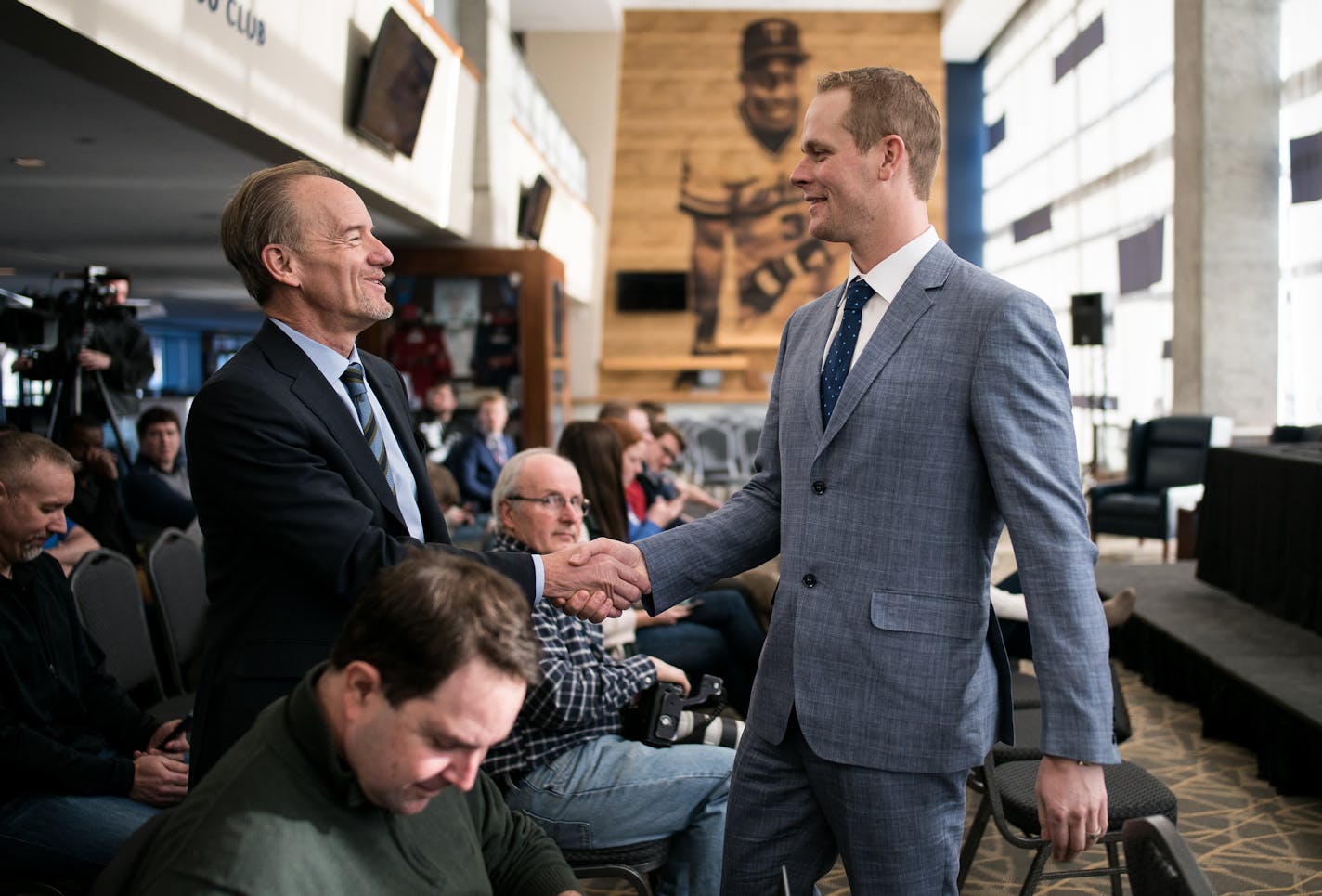 Minnesota Twins owner Jim Pohlad shook hands with former Twins first baseman Justin Morneau before Morneau's press conference officially announcing his retirement Wednesday afternoon. ] AARON LAVINSKY &#xef; aaron.lavinsky@startribune.com The Twins held an official retirement press conference for former first baseman Justin Morneau on Wednesday, Jan. 17, 2018 at Target Field in Minneapolis, Minn.