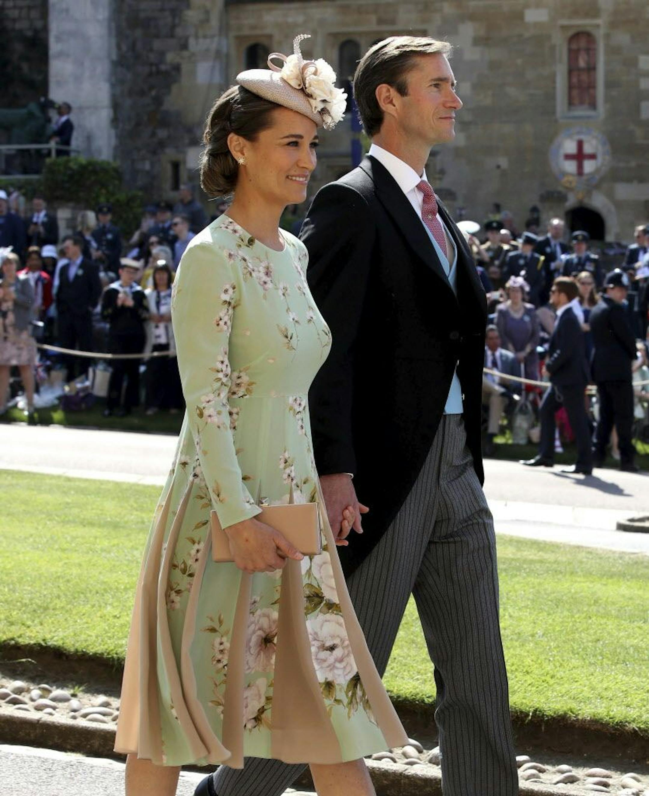Pippa Middleton and James Matthews arrive for the wedding ceremony of Prince Harry and Meghan Markle at St. George's Chapel in Windsor Castle in Windsor, near London, England, Saturday, May 19, 2018.