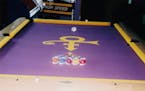 A pool table at Paisley Park bears Prince's symbol.