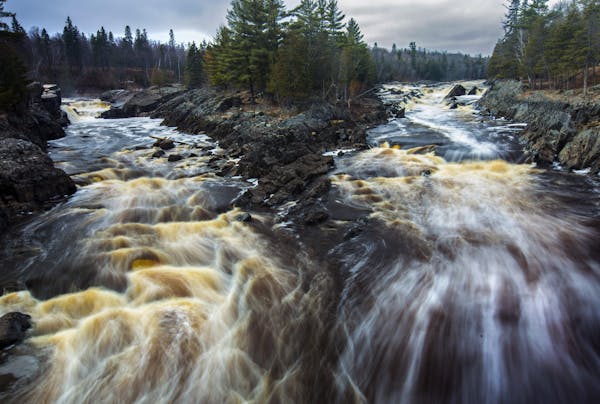 Spring run-off spills over granite outcrops on the St. Louis River at Jay Cooke State Park. ] Spring is waterfall season on the North Shore of Lake Su