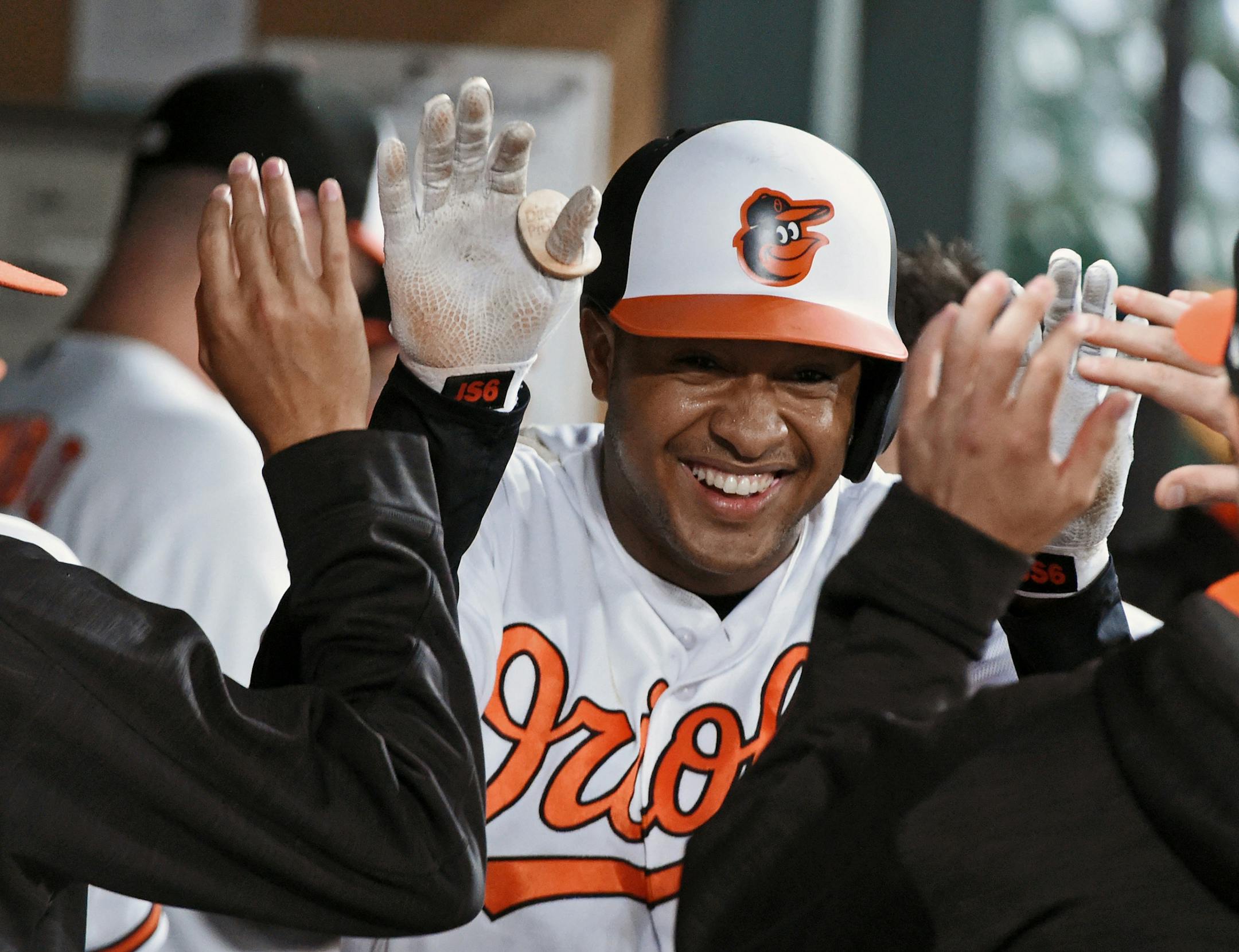 The Baltimore Orioles' Jonathan Schoop celebrates in the dugout after his solo home run against the Seattle Mariners in the first inning at Oriole Park at Camden Yards in Baltimore on Tuesday, Aug. 29, 2017. The Orioles won, 4-0. (Kenneth K. Lam/Baltimore Sun/TNS) ORG XMIT: 1250364