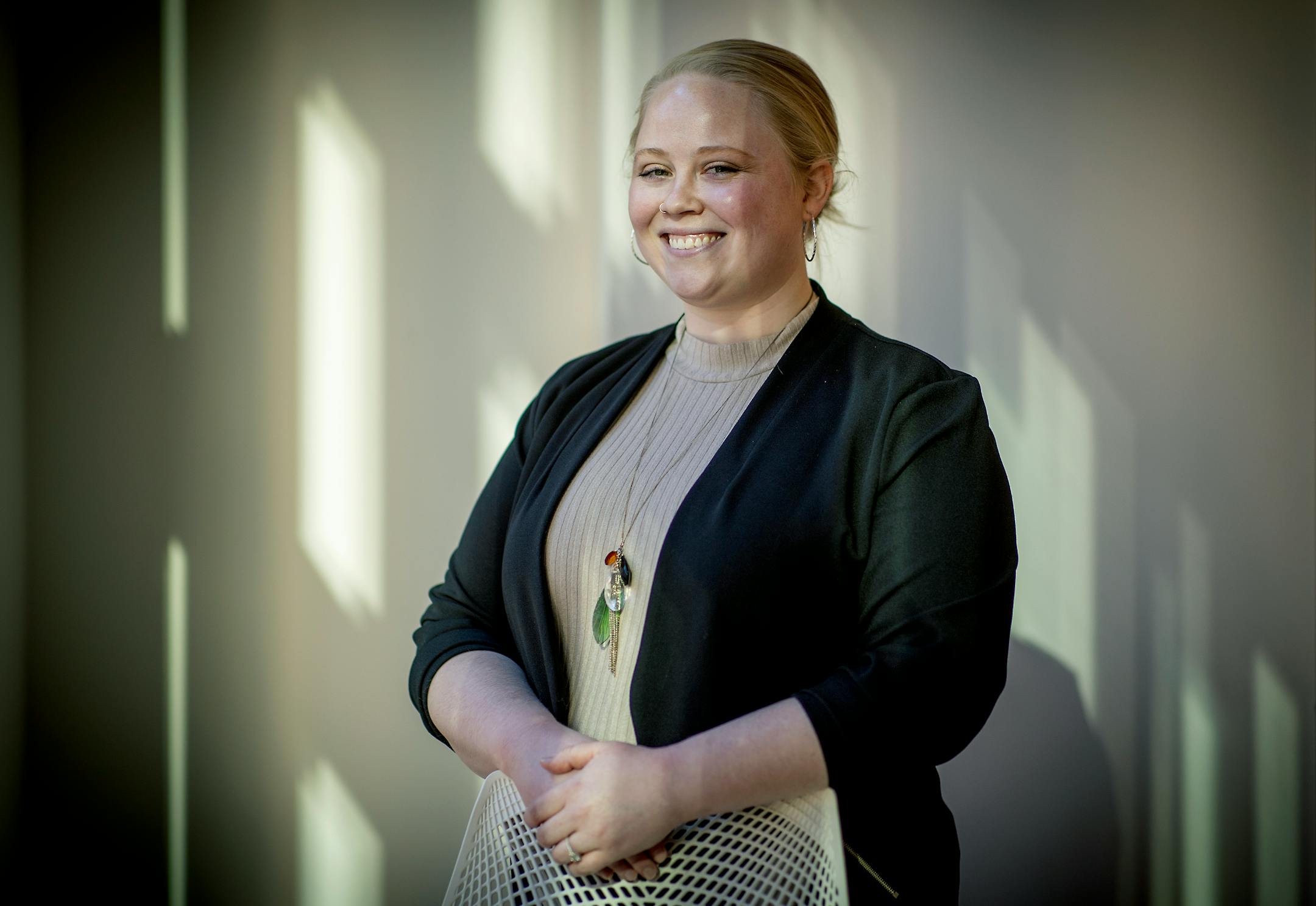 Katie Retterath Martin is developing a more equitable and diverse library cataloging system. Here she is photographed in Minneapolis, Minn., on Thursday, December 2, 2021. ] Elizabeth Flores • liz.flores@startribune.com