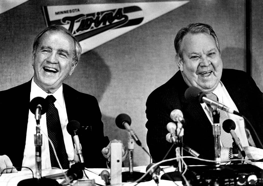 Carl Pohlad, left, and Calvin Griffith laughed during a press conference in June of 1984 at the Metrodome announcing the sale of the Twins — it remains the only sale in franchise history.
