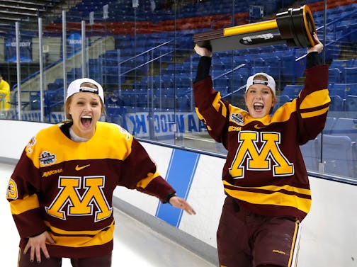 The Gophers' Taylor Williamson, right, and Caitlin Reilly celebrated after defeating Boston College 3-1 in the NCAA Women's Frozen Four championship game in Durham, N.H., on Sunday.