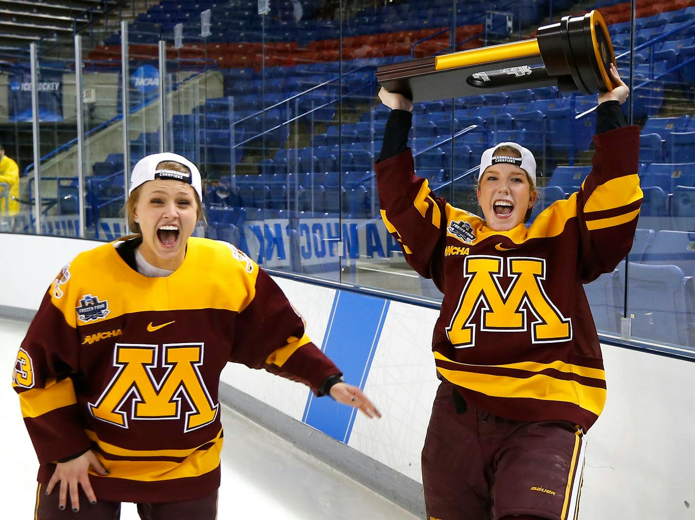 The Gophers' Taylor Williamson, right, and Caitlin Reilly celebrated after defeating Boston College 3-1 in the NCAA Women's Frozen Four championship game in Durham, N.H., on Sunday.