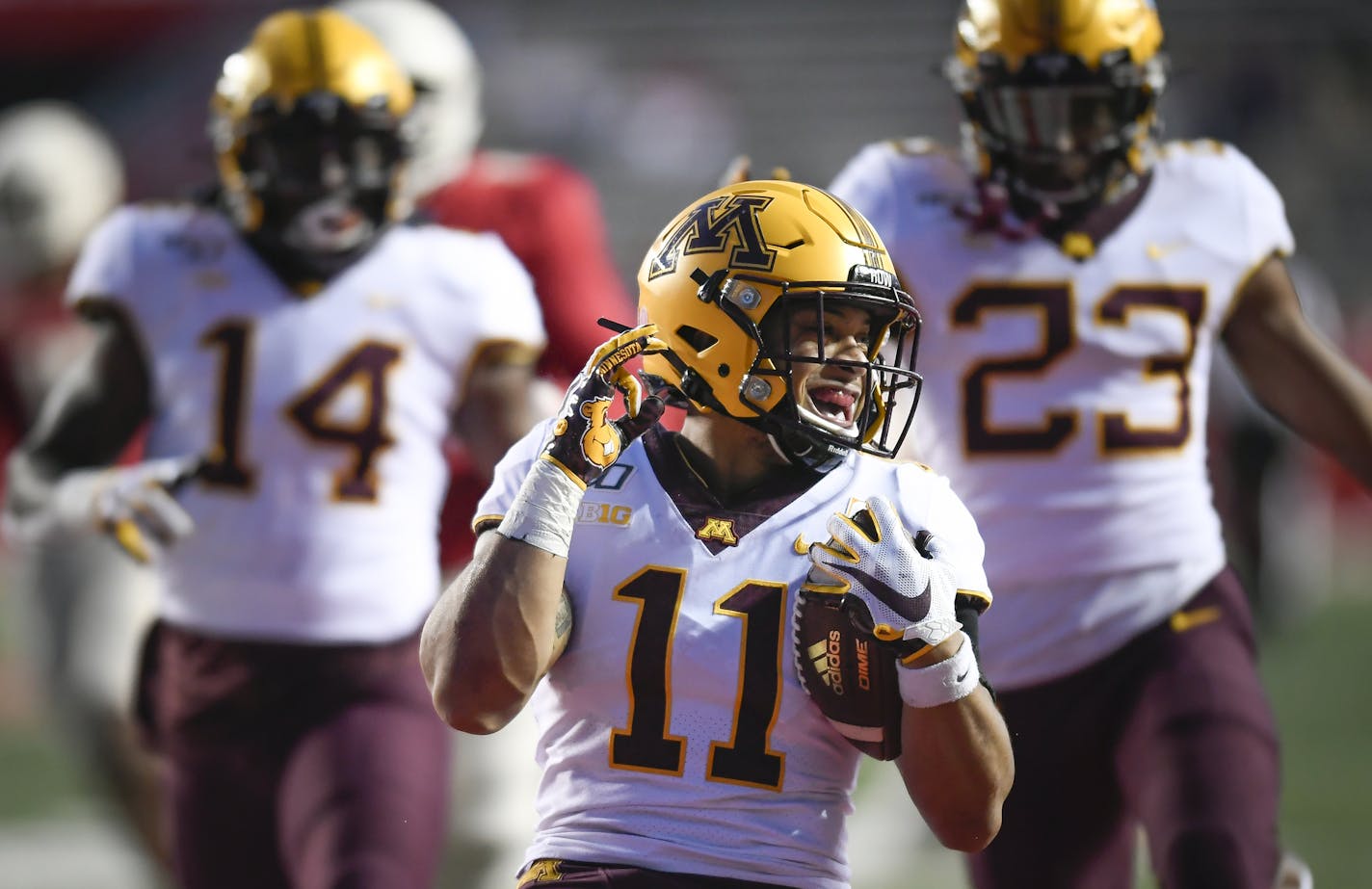 Gophers defensive back Antoine Winfield Jr. celebrated his fourth quarter touchdown on a pick-6 against Rutgers.