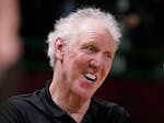 Basketball Hall of Fame legend Bill Walton, who died Monday at age 71, laughs during a practice session for the NBA All-Star Game in Cleveland, Feb. 1