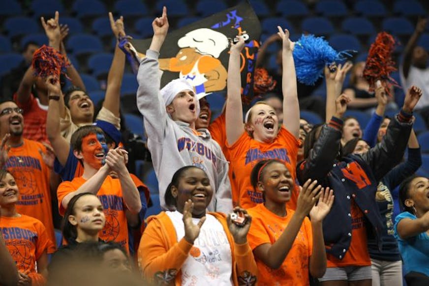 Boys Basketball Tournament-Class 3A, Target Center. Washburn vs. St. Paul Johnson. (left to right) Washburn High School students cheered on the Millers as they beat St. Paul Johnson to advance to the championship game.