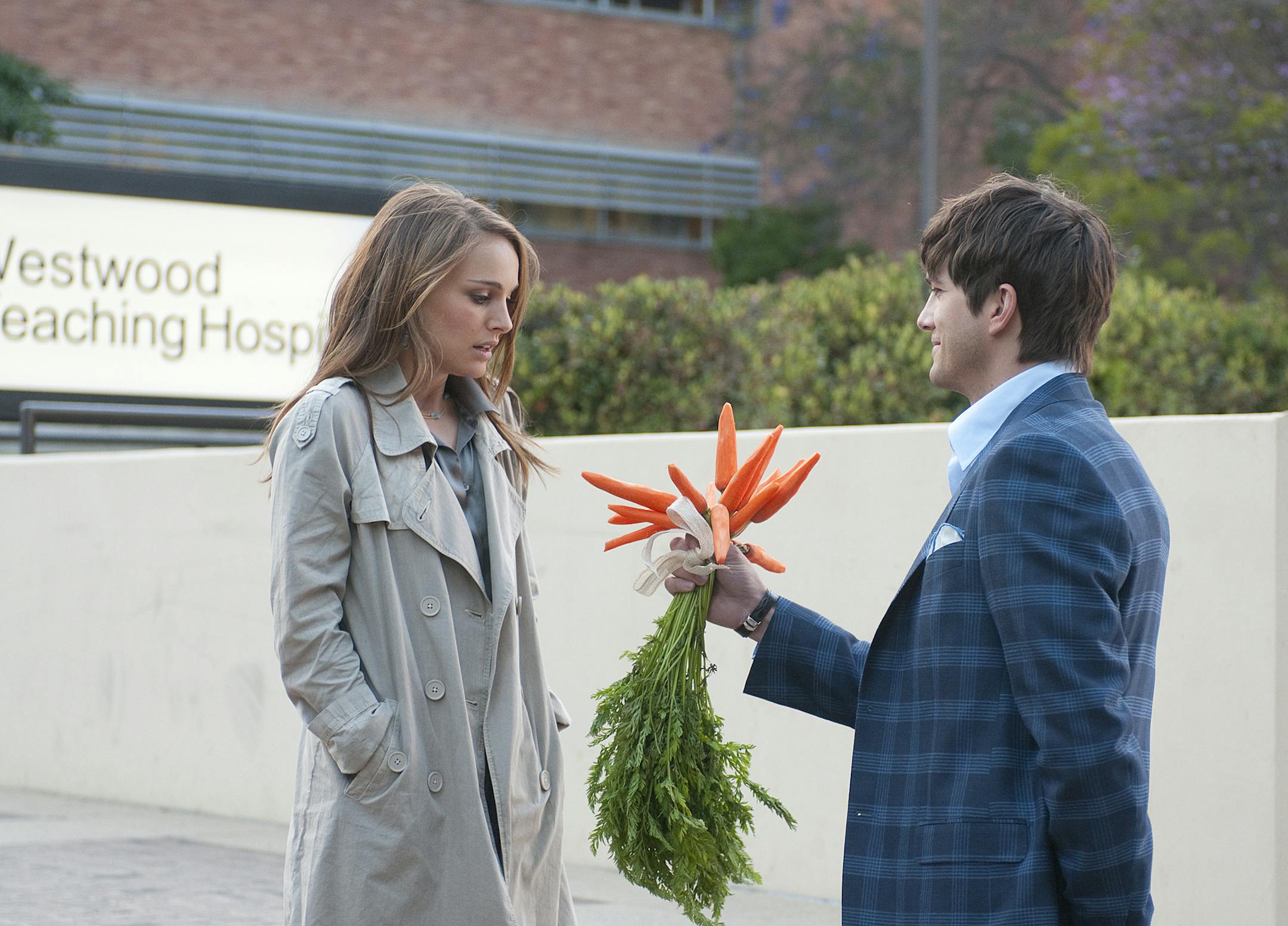 In this film publicity image released by Paramount, Ashton Kutcher, right, and Natalie Portman are shown in a scene from "No Strings Attached." (AP Photo/Paramount, Dale Robinette) ORG XMIT: NYET810