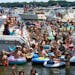 Tom Palm also known as the Tonka Paparazza spends hours on Lake Minnetonka photographing folks on their pontoons, speedboats and Jetskis, then posting
