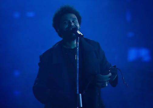 The Weeknd performs in Vancouver, British Columbia on Aug. 23, 2022. The Weeknd suddenly ended his sold-out concert in Southern California after losing his voice during a mid-song performance. The four-time Grammy winner was performing his third song "Can't Feel My Face" before he abruptly stopped his show Saturday, Sept. 3, 2022 at SoFi Stadium in Inglewood, Calif. (Darryl Dyck/The Canadian Press via AP)