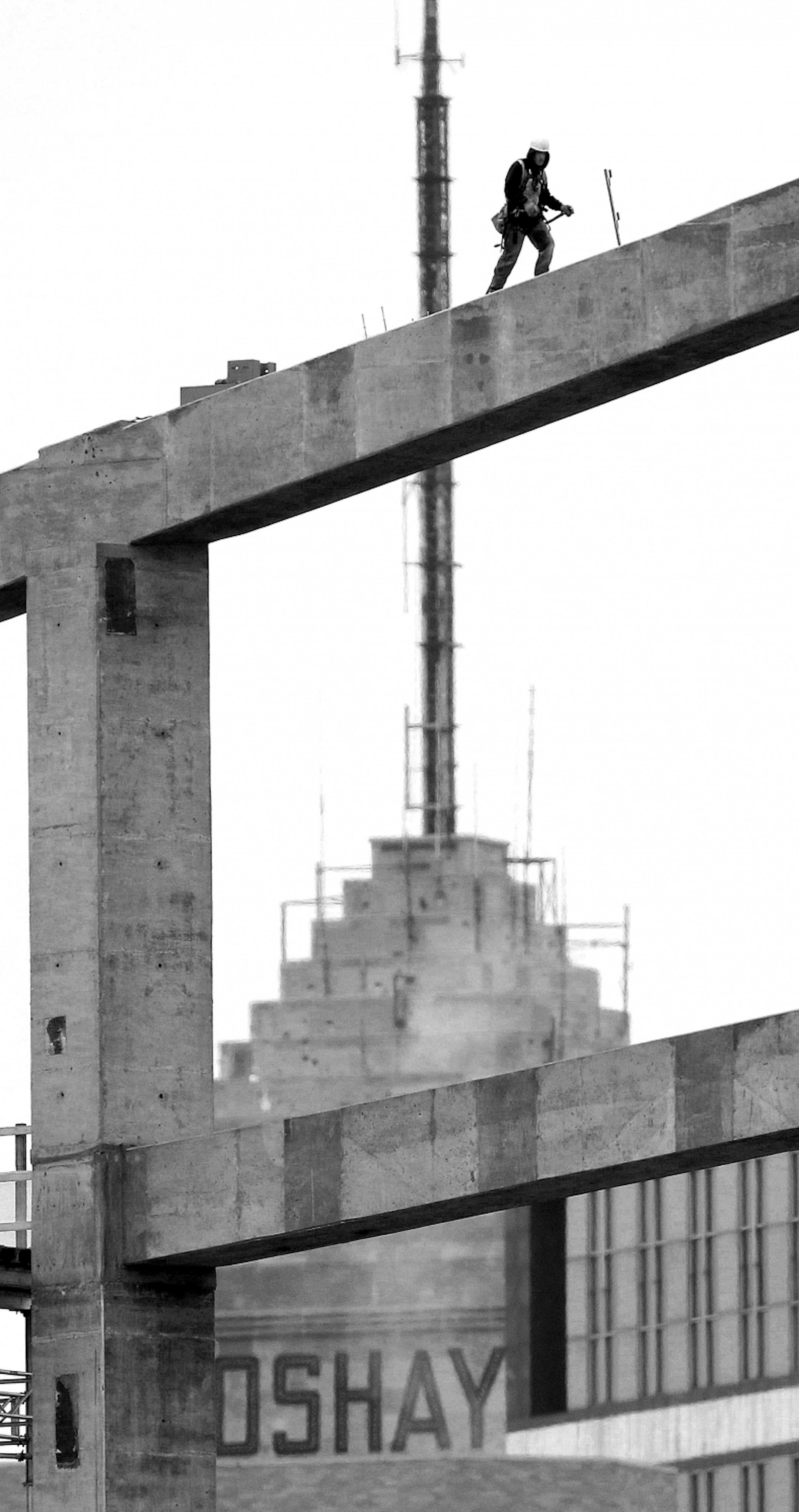 2015: A construction worker walked along the top of a concrete beam while laboring on the new Vikings stadium.