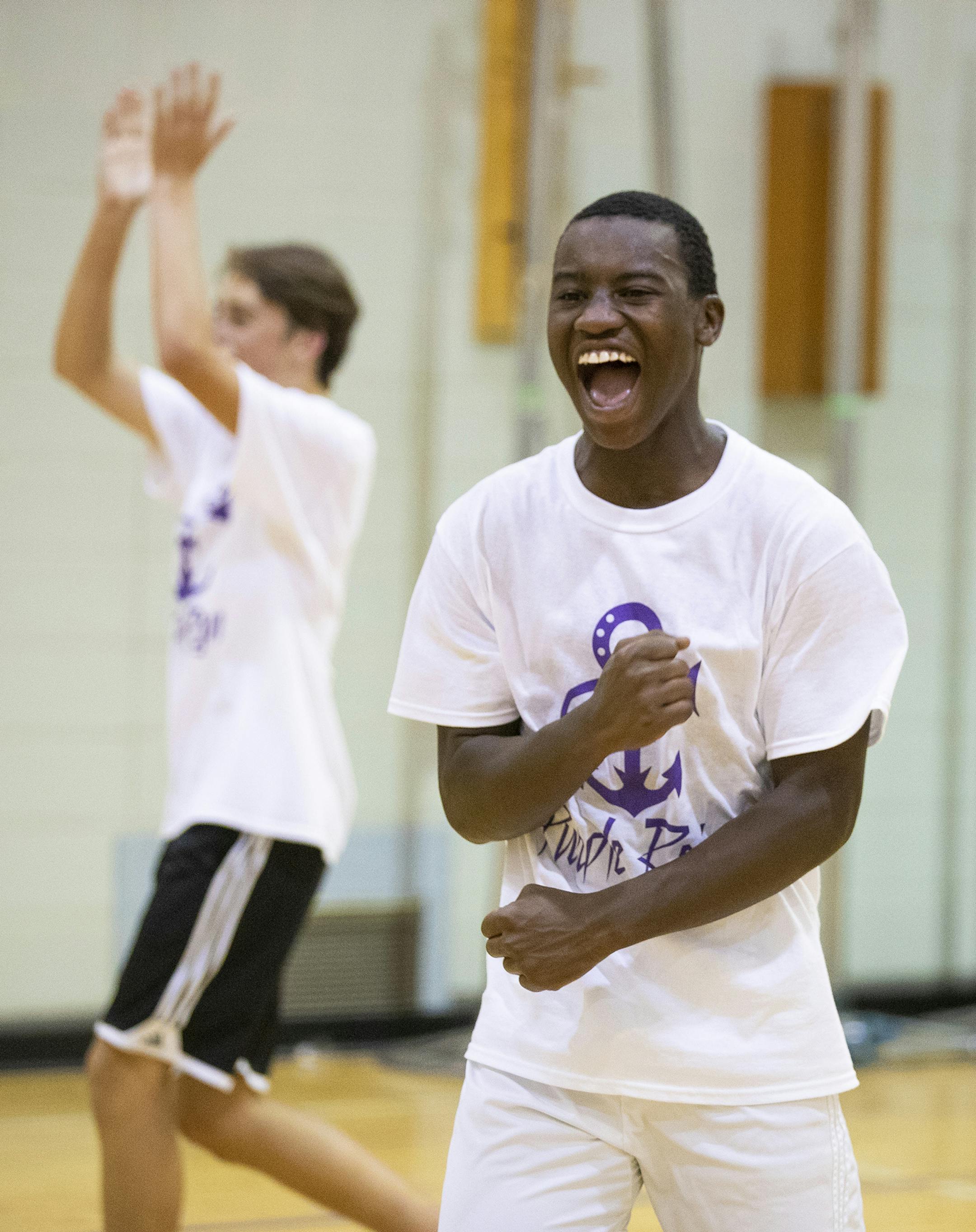 Once unable to speak or understand English, Ouro-Akondo now speaks with assurance as he coaxes and cajoles the best from his teammates.