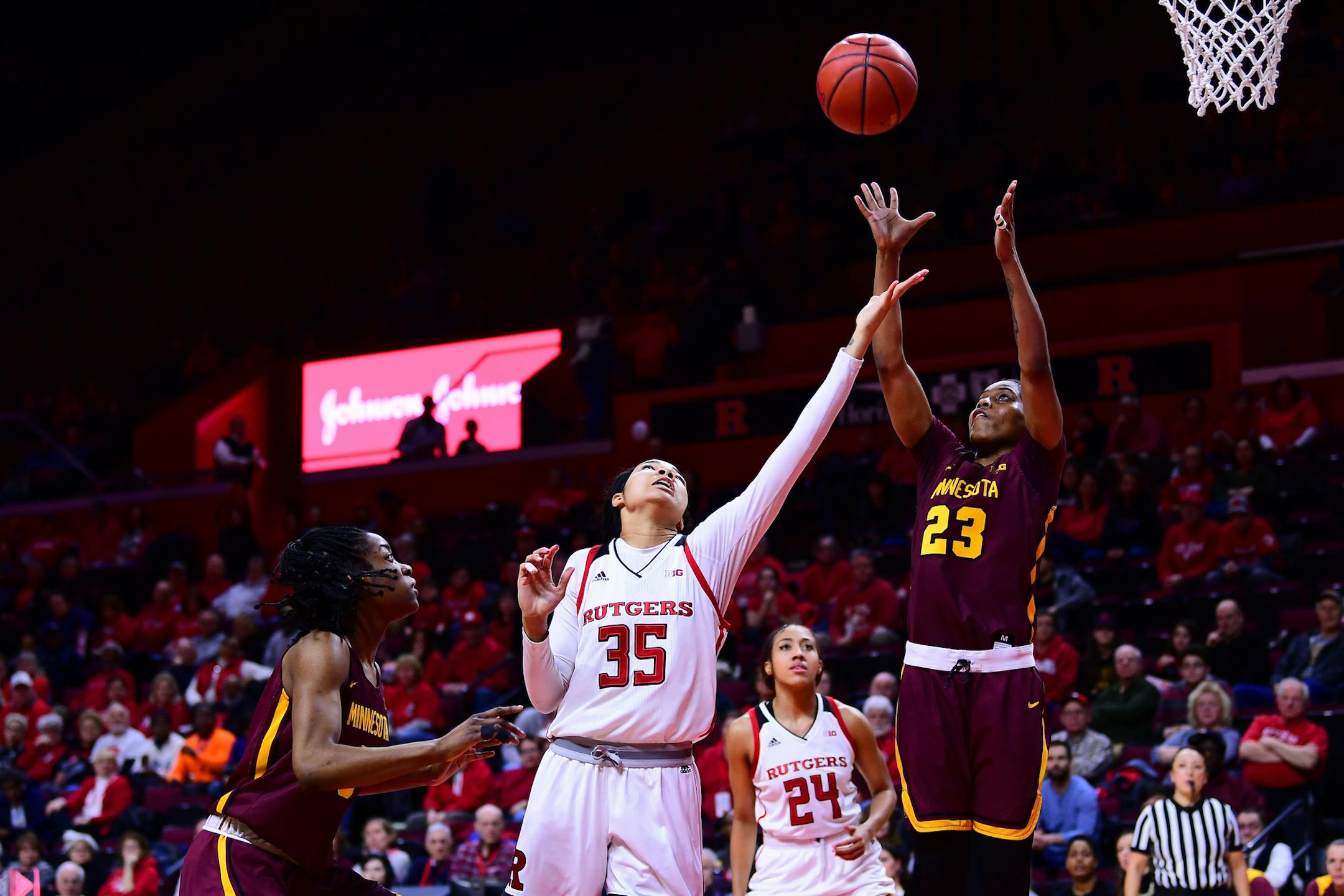 The Gophers' Kenisha Bell tried to secure the ball against Rutgers' Stasha Carey on Thursday, Feb. 28, 2019, in Piscataway, N.J. (Ben Solomon/Rutgers Athletics)