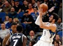 Wolves guard Ricky Rubio, right, shot past the Sacramento Kings' Darren Collison on Saturday.