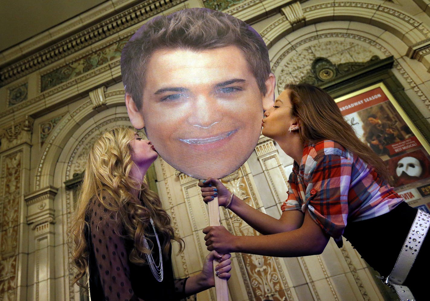 Makena Yunker,17 of Delano and Madison Schaad, 17, of Mound posed with a cut out of Hunter Hayes in the lobby of at the Orpheum Theatre in Minneapolis before his concert on Wednesday night. ] CARLOS GONZALEZ cgonzalez@startribune.com - December 4, 2013, Minneapolis, Minn., Orpheum Theatre, Review of hot country heartthrob Hunter Hayes, Ashley Monroe opens