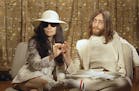 This 1969 photo shows musician John Lennon, right, and his wife Yoko Ono during a press conference. An album, "Gimme Some Truth" by John Lennon, will 