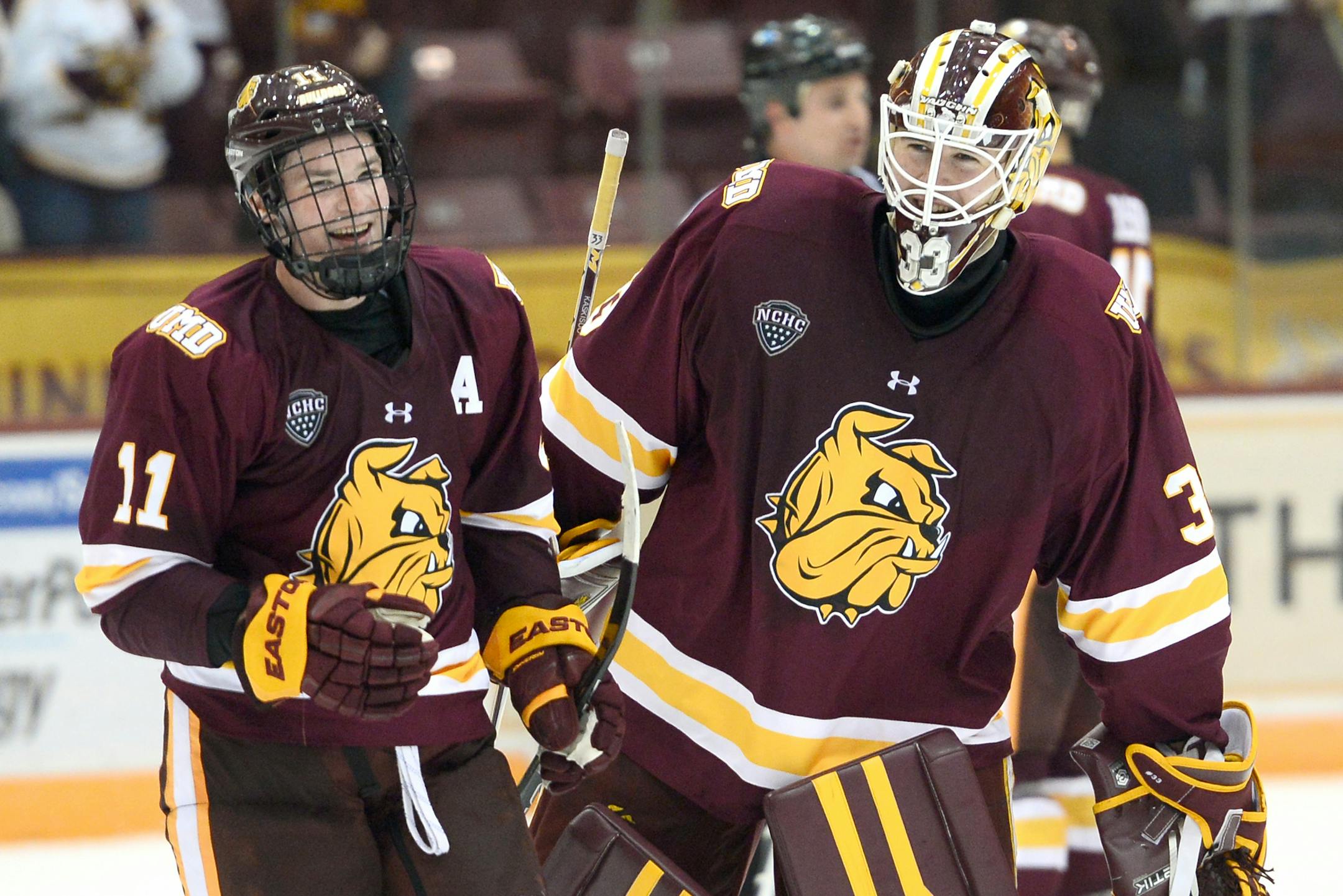 University of Minnesota Duluth forward Austin Farley (11) and goalie Kasimir Kaskisuo (33) smiled as they left the ice after Friday night's 3-1 victory over the University of Minnesota. ] (AARON LAVINSKY/STAR TRIBUNE) aaron.lavinsky@startribune.com The Minnesota Gophers Men's Hockey Team plays the University of Minnesota Duluth Bulldogs on Friday, Oct. 16, 2015 at Mariucci Arena in Minneapolis, Minn. ORG XMIT: MIN1510162145271276