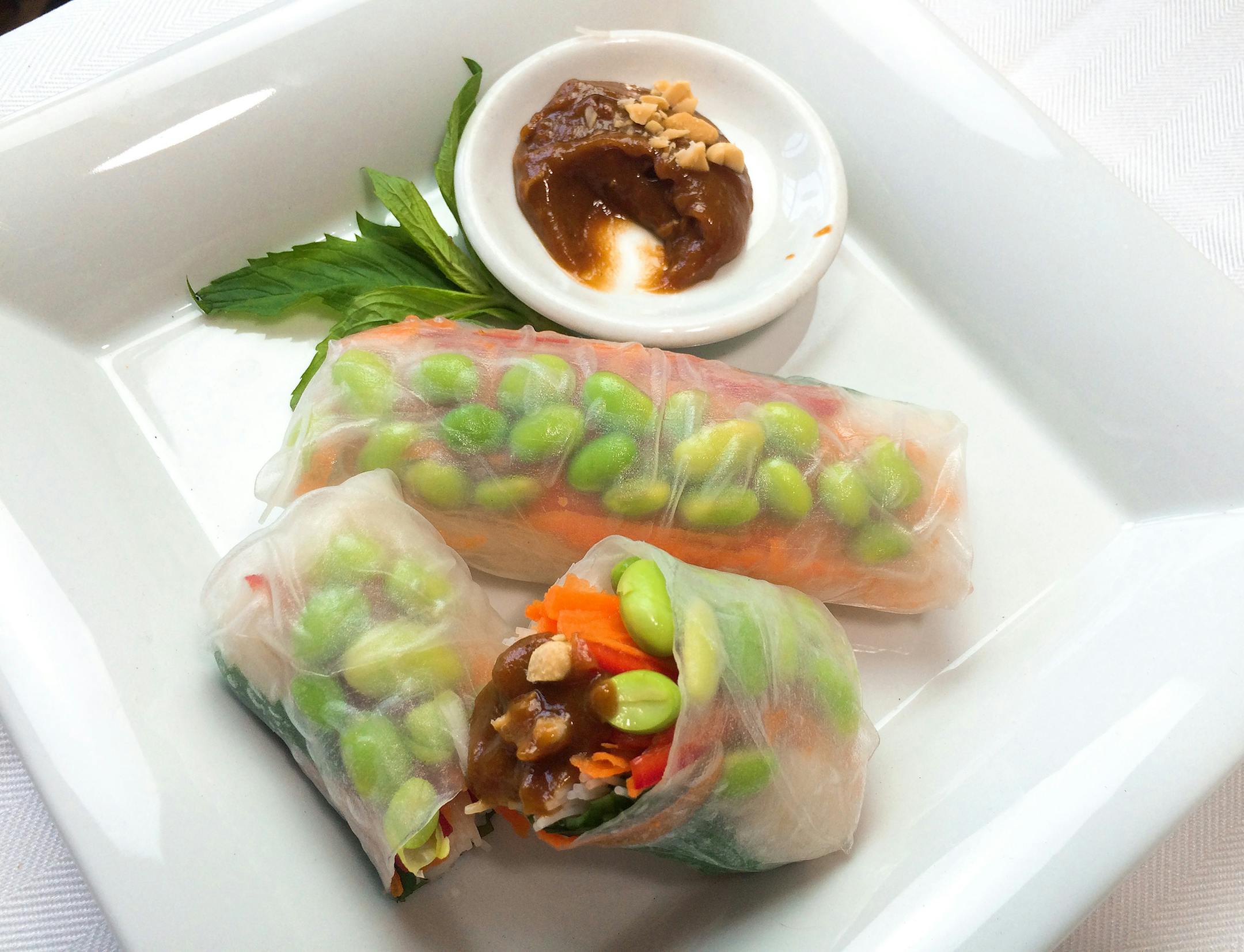 Robin Asbell, Special to the Star Tribune Edamame and Mint Summer Rolls With Peanut Sauce