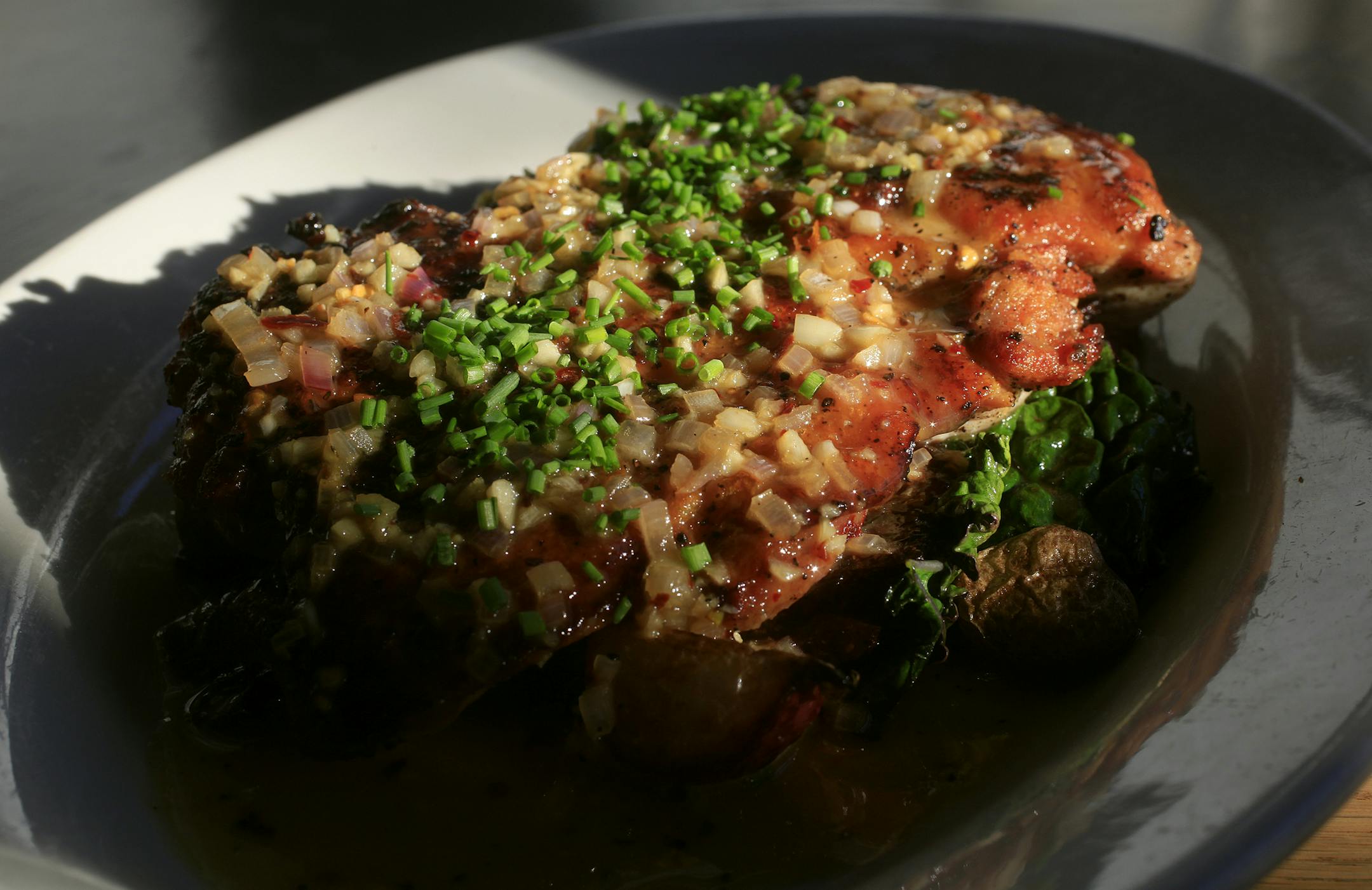 Roast chicken at The Gray House at 610 W. Lake Street in Minneapolis, MN at on November 1, 2012. ] JOELKOYAMA‚Ä¢joel.koyama@startribune.com Restaurant review. Could you please shoot a portrait of chef/owner Ian Gray? Food: roast chicken, tuna tartare, cheese plate, chocolate mousse. They have a great beer list, perhaps a photo of a locally brewed beer being pulled off the tap, with the dining room in the background, as the environmental shot?