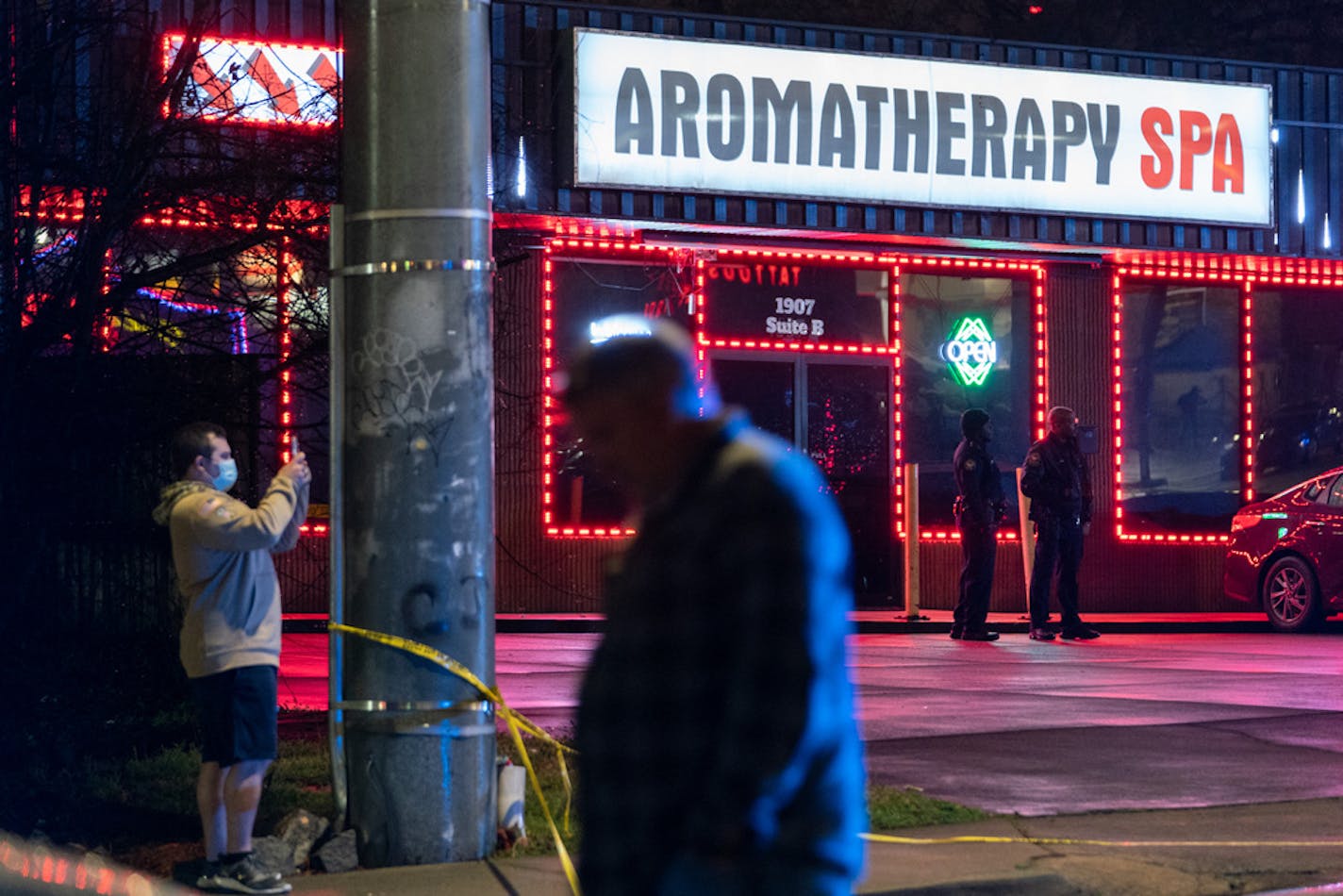 Law enforcement personnel are seen outside a massage parlor where a person was shot and killed on March 16, 2021, in Atlanta, Georgia. Eight people were killed in shootings at three different spas in Georgia on March 16 and a 21-year-old male suspect was in custody, police and local media reported. (Elijah Nouvelage/AFP/Getty Images/TNS) ORG XMIT: 11317729W