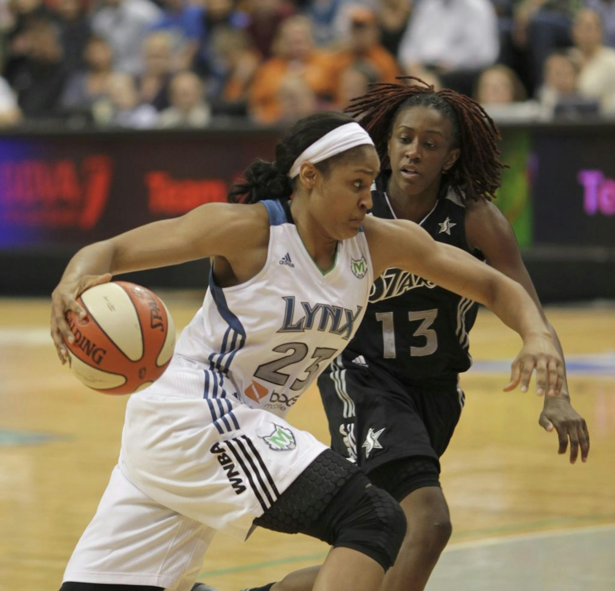 The Lynx's Maya Moore drove to the net in the fourth quarter against the Stars' Danielle Robinson Tuesday night. The Minnesota Lynx beat the San Antonio Silver Stars 85-67 in game three of their WNBA first round playoff series Tuesday night, September 20, 2011 at Target Center in Minneapolis, Minn.