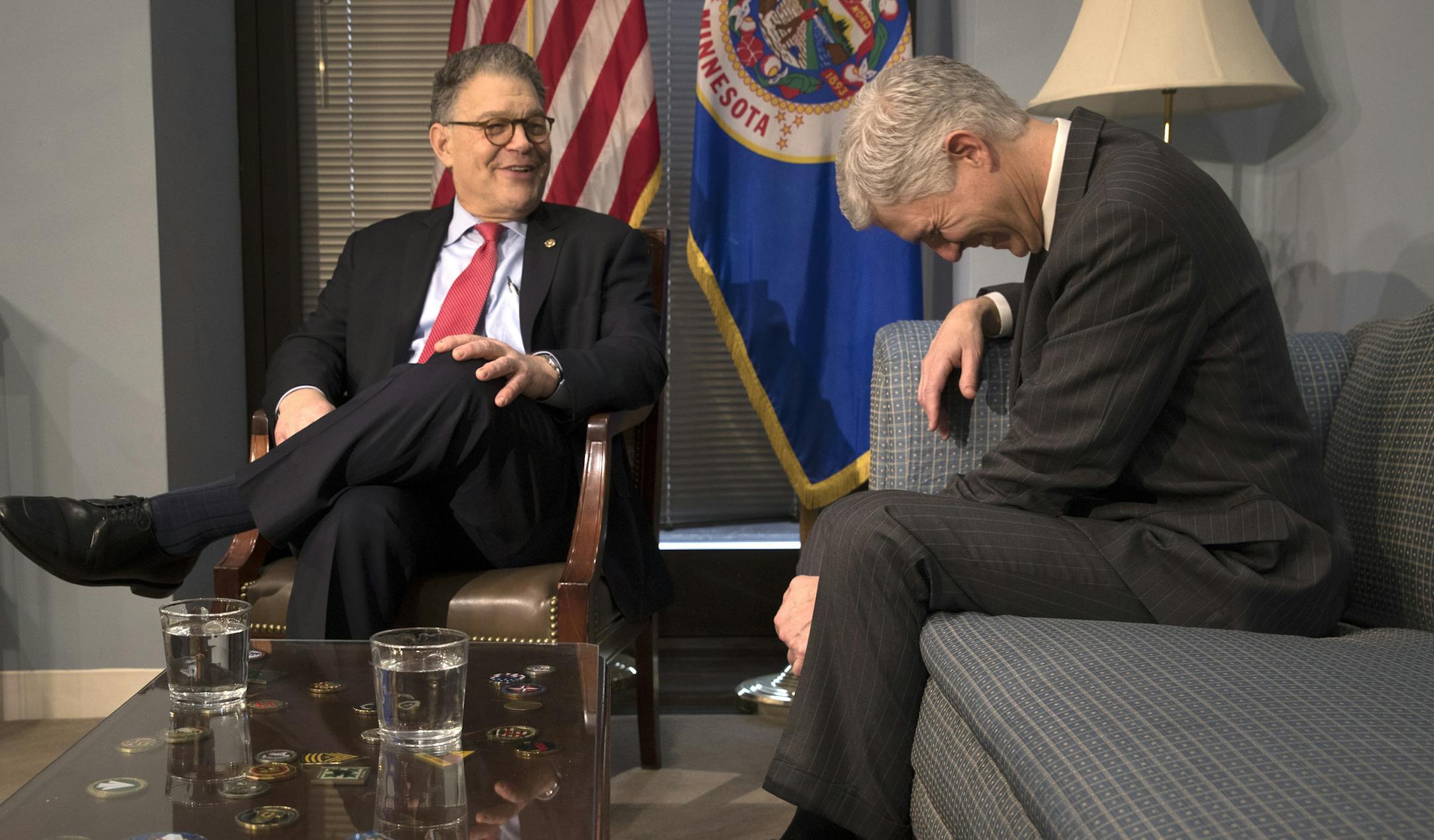 Sen. Al Franken (D-Minn.) and Judge Neil Gorsuch share a laugh as they met on Capitol Hill in Washington, March 7, 2017. Confirmation hearings for Gorsuch, President Donald Trumpís nominee to the Supreme Court, are set to begin on March 20. (Stephen Crowley/The New York Times)