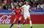 The United States' Alex Morgan, left, dueled for the for the ball against England's Jill Scott in the Women's World Cup semifinals.