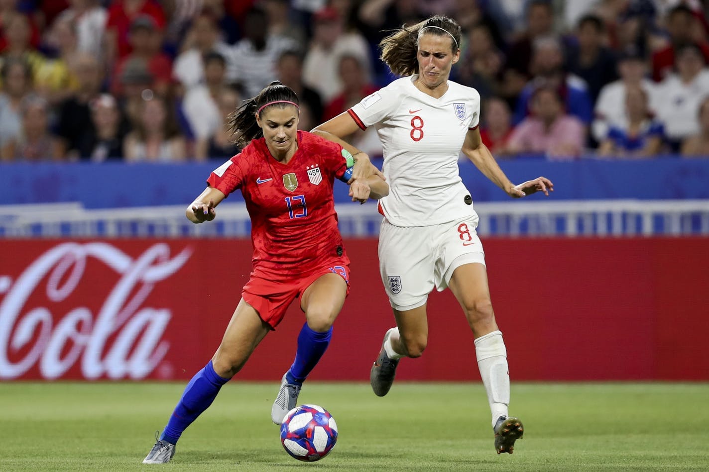 The United States' Alex Morgan, left, dueled for the for the ball against England's Jill Scott in the Women's World Cup semifinals.